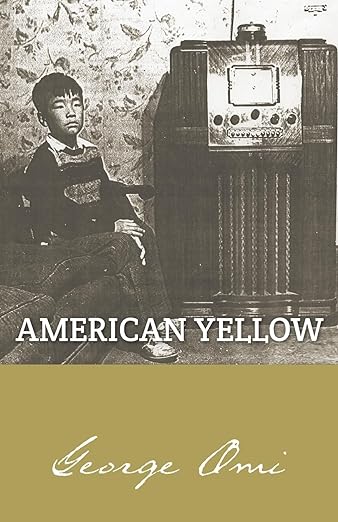 The cover of George Omi's American Yellow shows a Japanese boy seated on a couch to the left of a large machine.