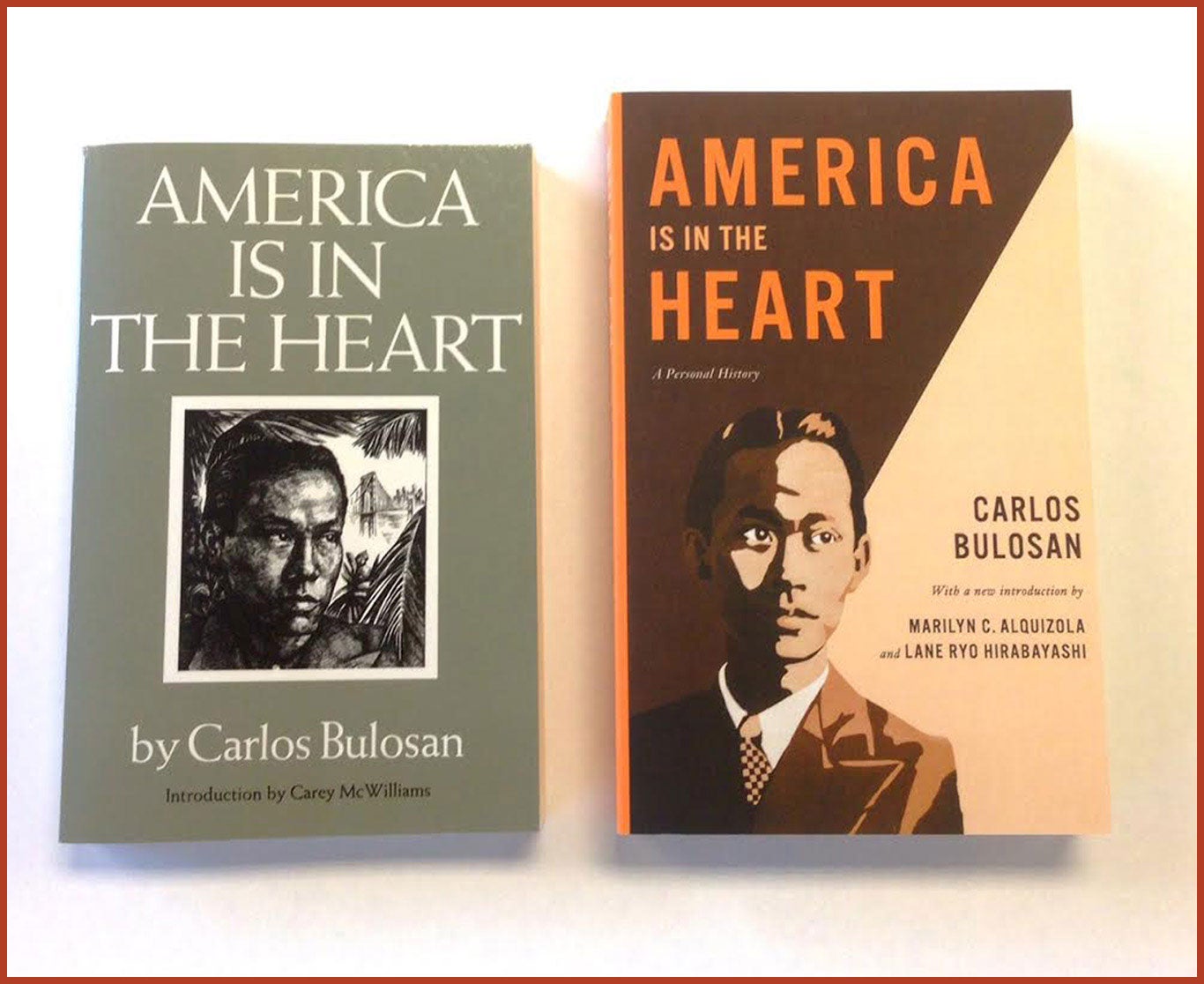 A 1973 copy and 2014 copy of America Is In the Heart by Carlos Bulosan.