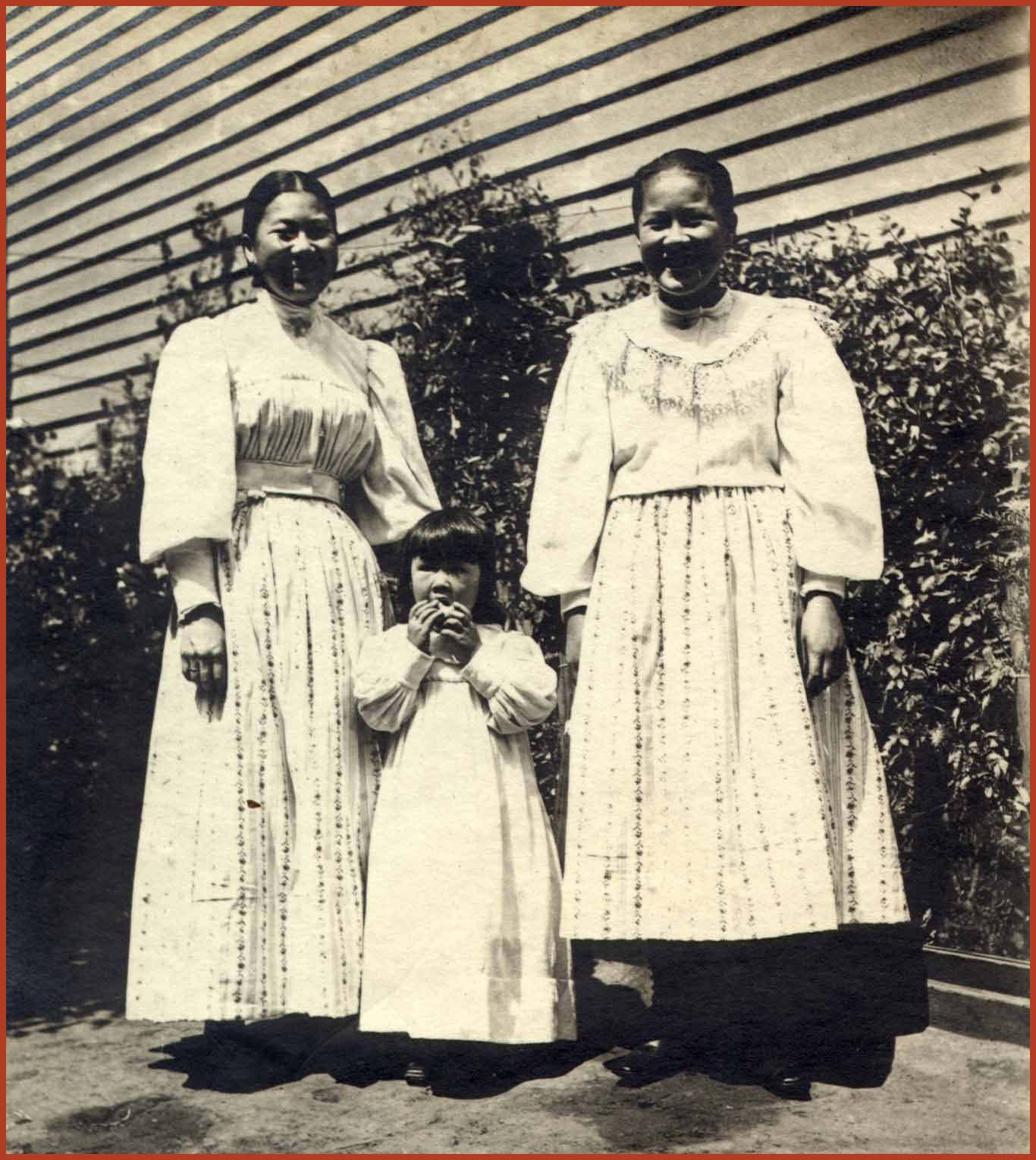 Sisters Mamie (left), Emily (right), and Gertrude Tape.
