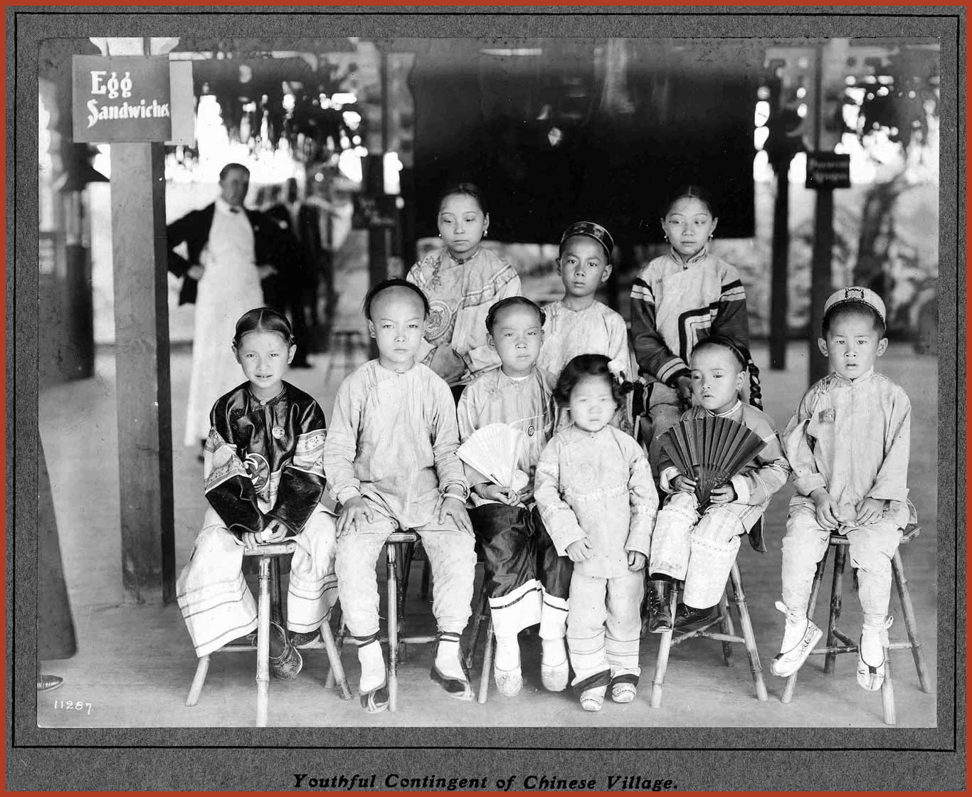 A group of ten Chinese American children of various ages, dressed to appear as though they were from China.