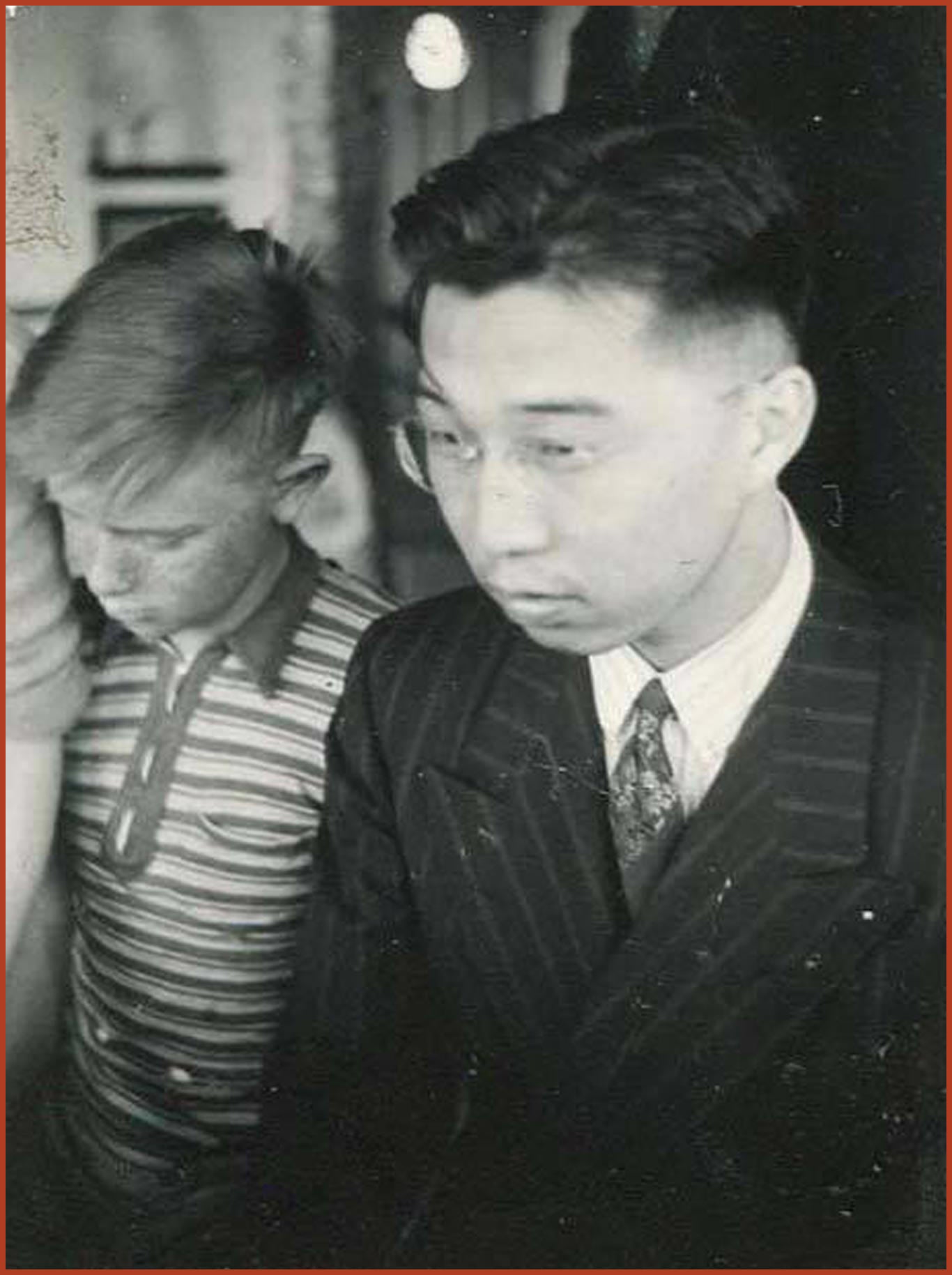 Gordon Hirabayashi and Bill Schmoe walk together.