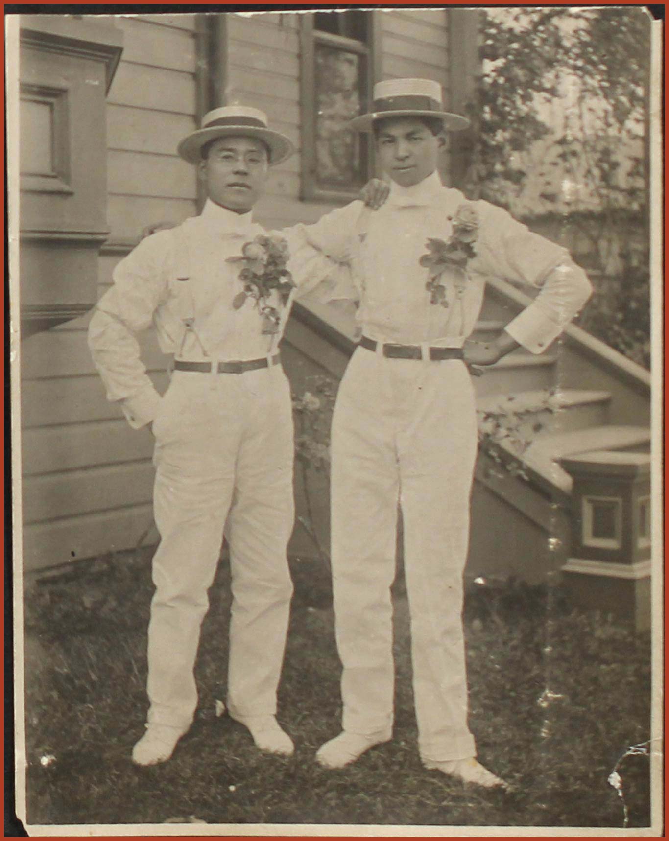 Masuo Yasui and Katsusaburo Tamura dressed in all-white clothing to attend the Portland's first Rose Festival parade.