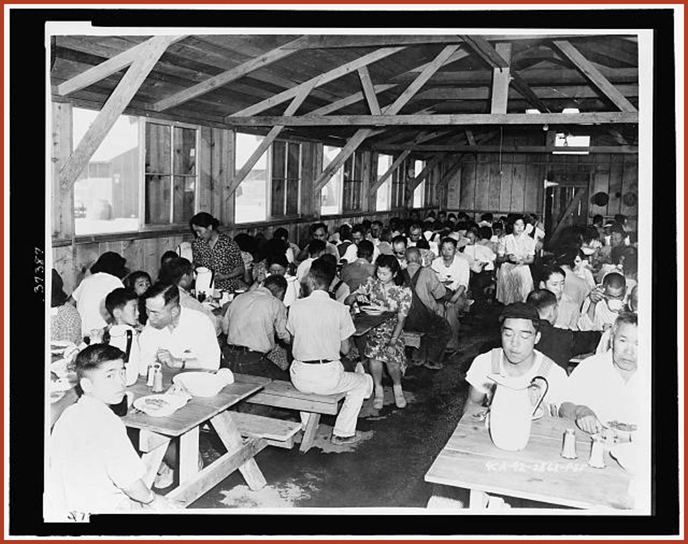 A packed mess hall of evacuees at the Pinedale Assembly Center.