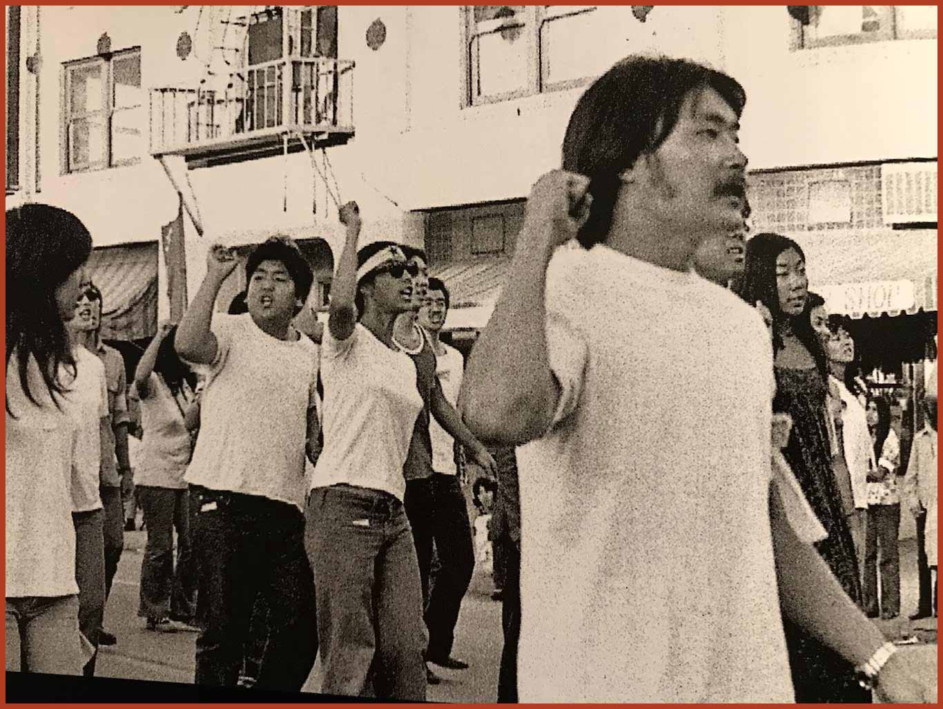 A group of activists from the Van Troi Youth Brigade march during a demonstration.