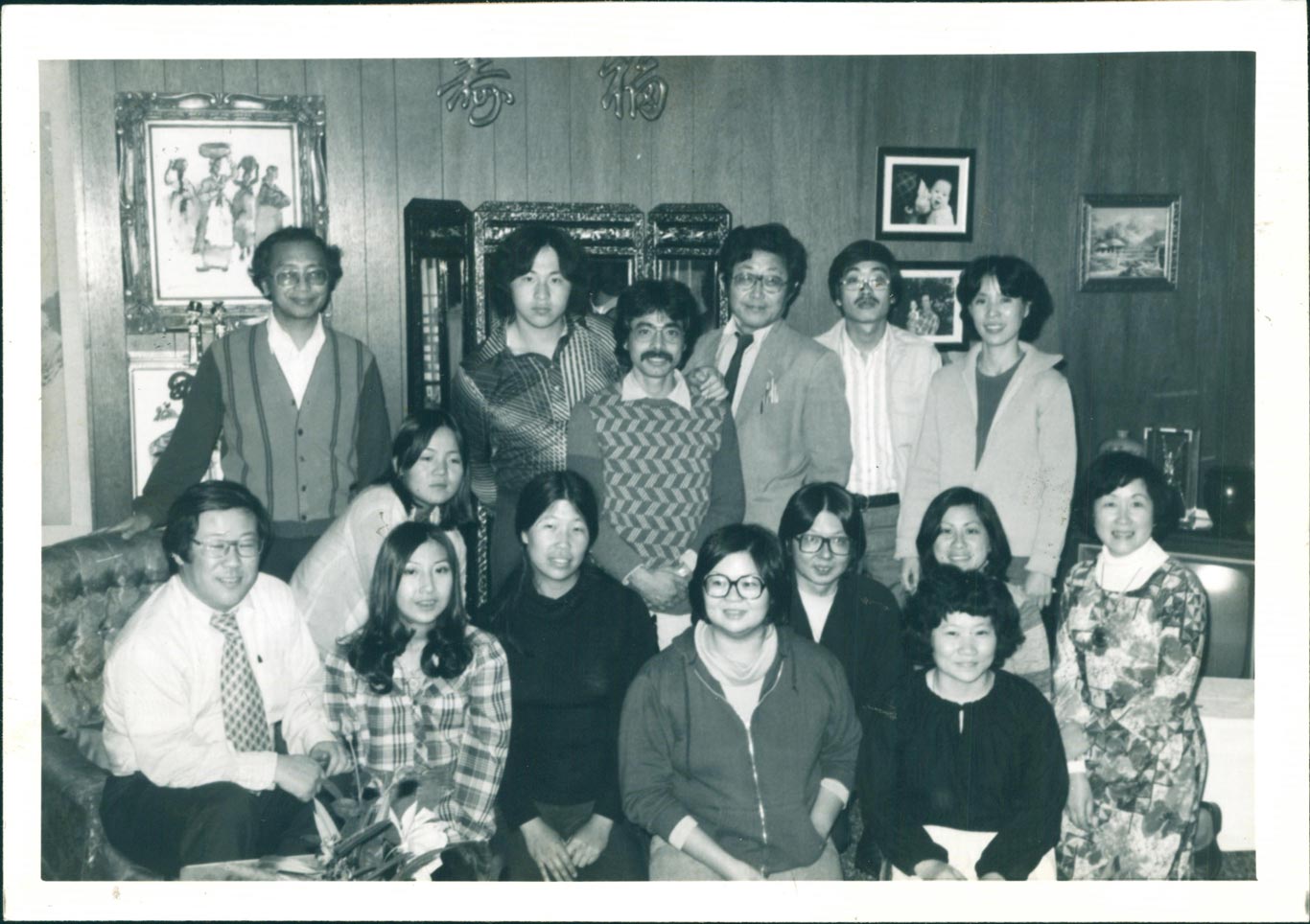 Portrait of a group of 16 individuals.