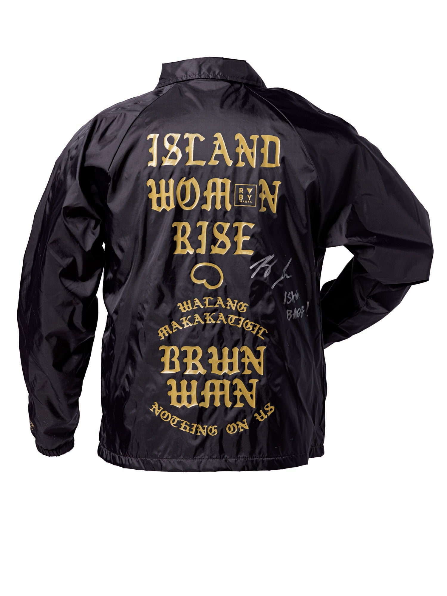 Black jacket signed by Ruby Ibarra with lyrics from "Us" in gold lettering: "Island woman rise / walang makakatigil / BRWN WMN / Nothing on us"