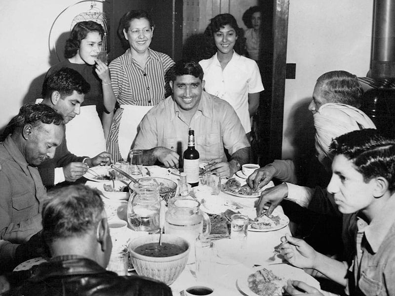 Punjabi Mexican couple Rosa and Jiwan Singh host dinner with family and friends. Indian wrestler Tiger Joginder Singh sits in the center.