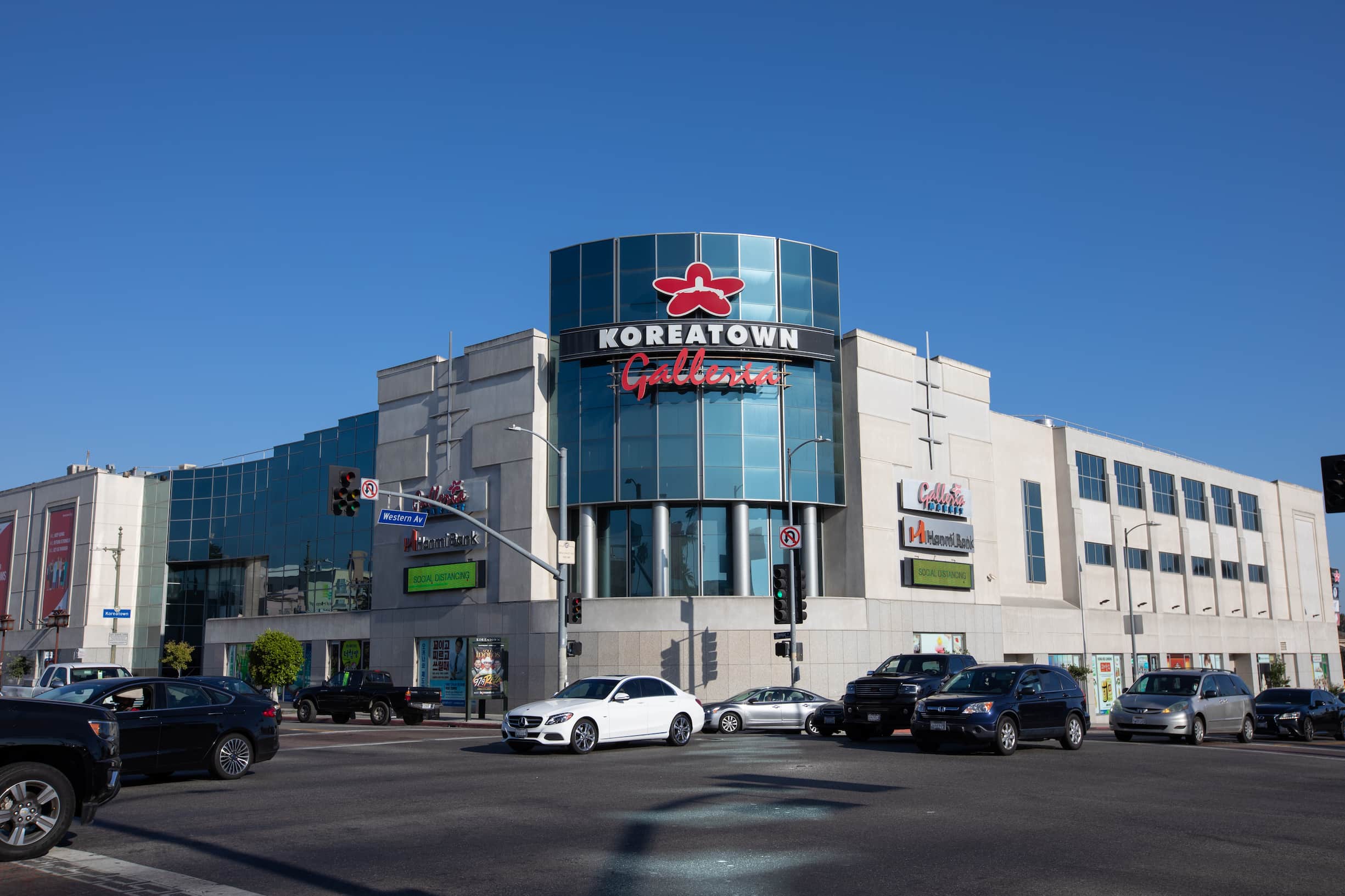 A large commercial building, with sign reading "Koreatown Galleria" at center.