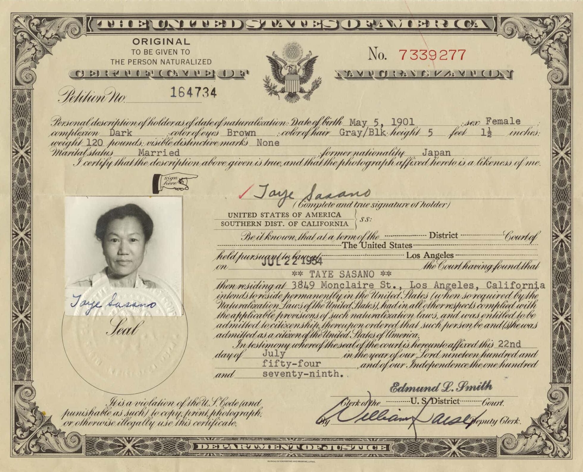 The naturalization certificate of Japanese American Taye Sasano. A portrait of Sasano is on the middle left and details of citizenship is on the left.