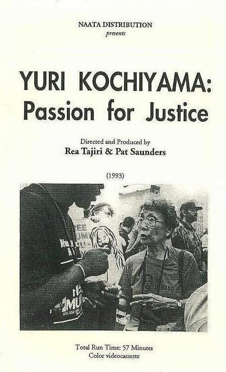 The cover of a film about Yuri shows her speaking to a younger man at a Mumia rally.