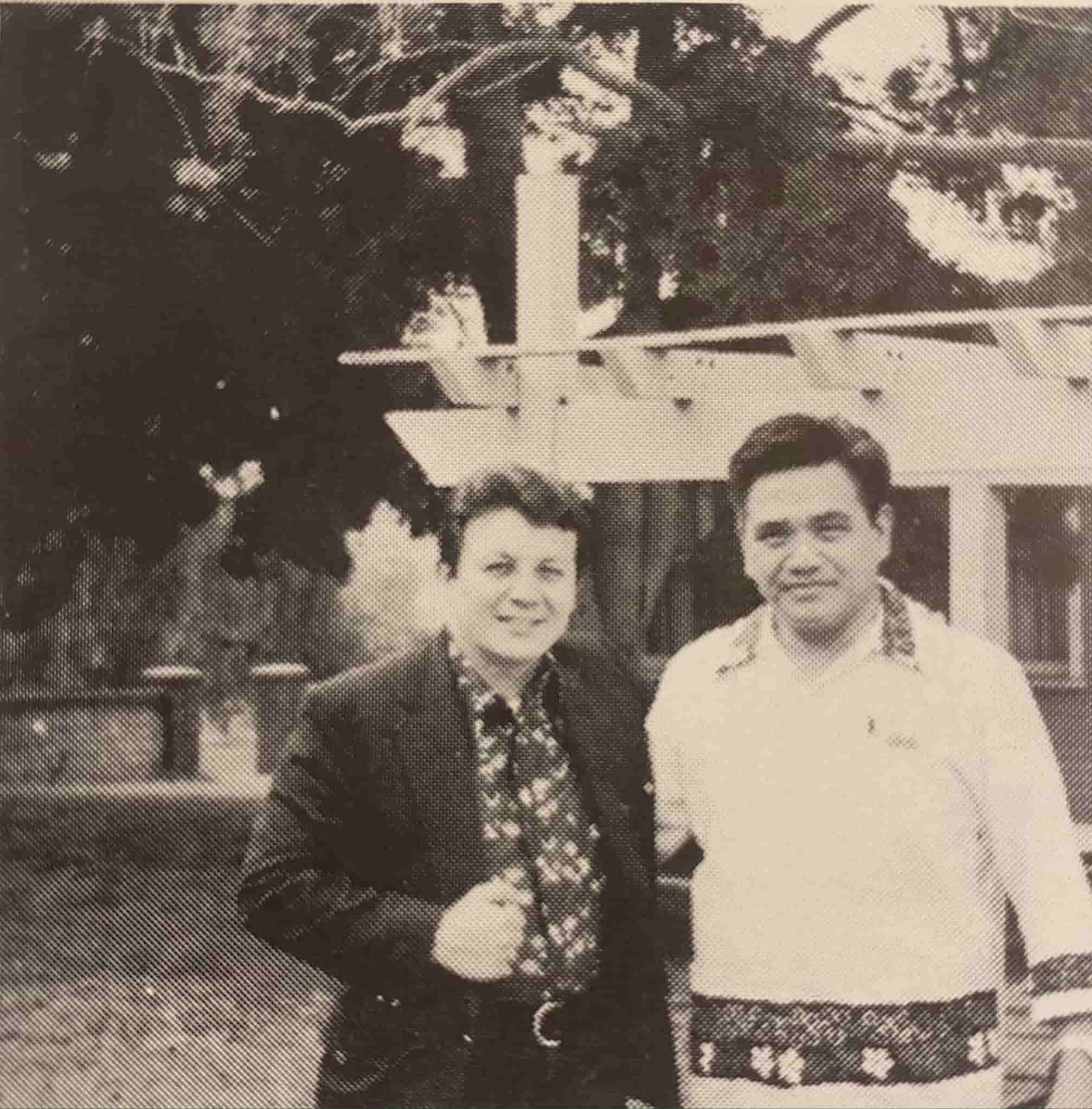 Guam Senator Paul Calvo, left, and former Guam Club president Jose Untalan, right, pose in front of the new club site with a pergola behind them.
