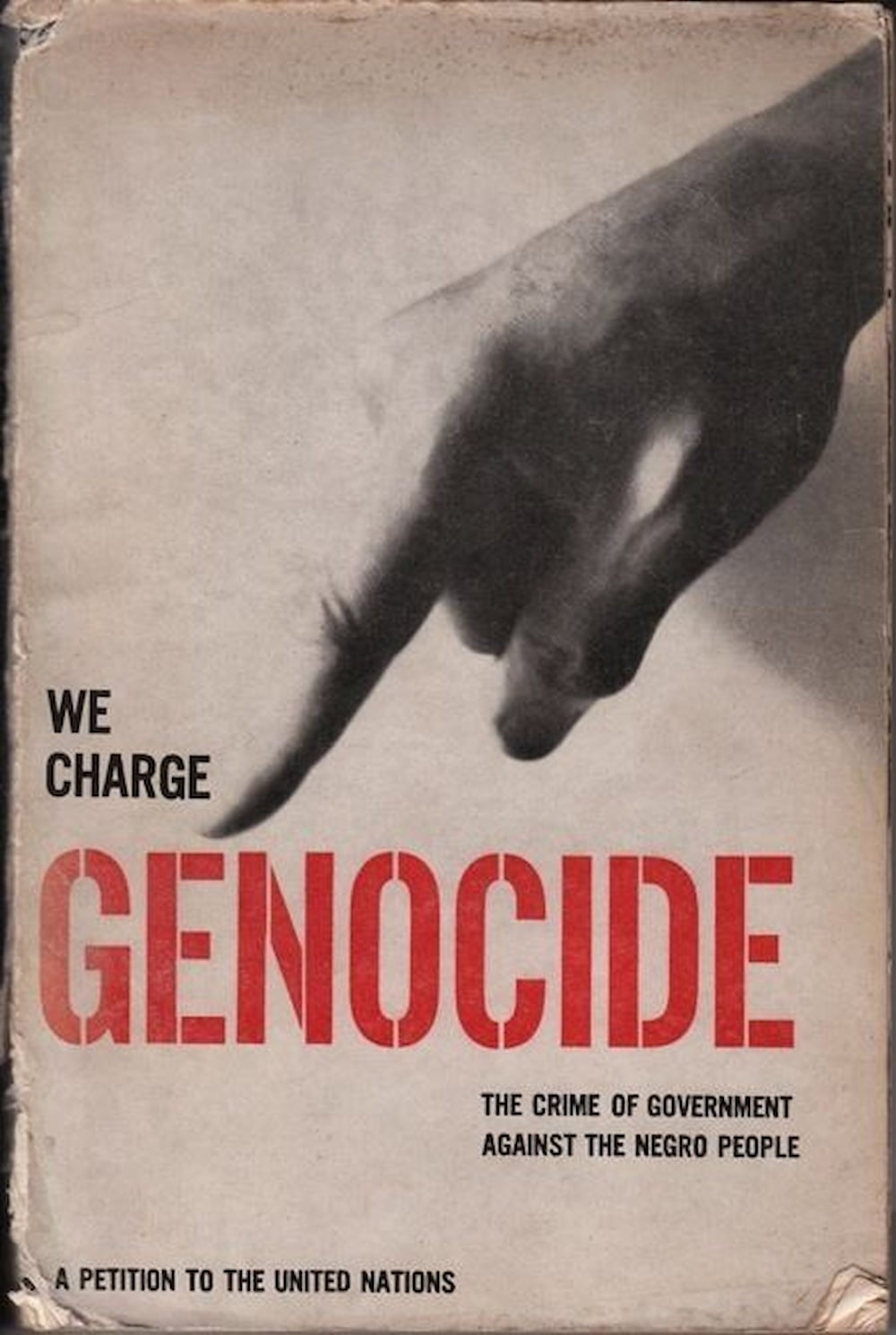 The cover of We Charge Genocide, a petition to the United Nations. A hand points at the word "Genocide" from the title.