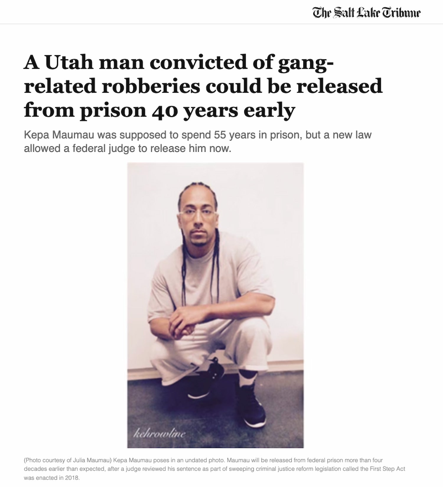 Portrait of Kepa Maumau, a Tongan man with braided hair and glasses, crouched against wall. Above, a headline on his possible release from prison.