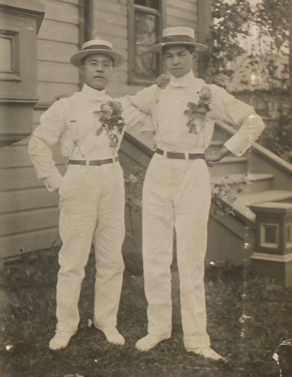 Masuo Yasui and Katsusaburo Tamura dressed in all-white clothing to attend the Portland's first Rose Festival parade.