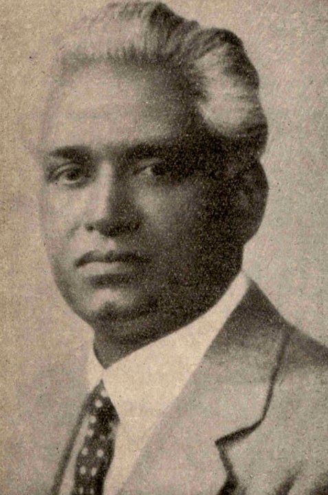 Sepia photo: Portrait of Taraknath Das wearing a western style suit.