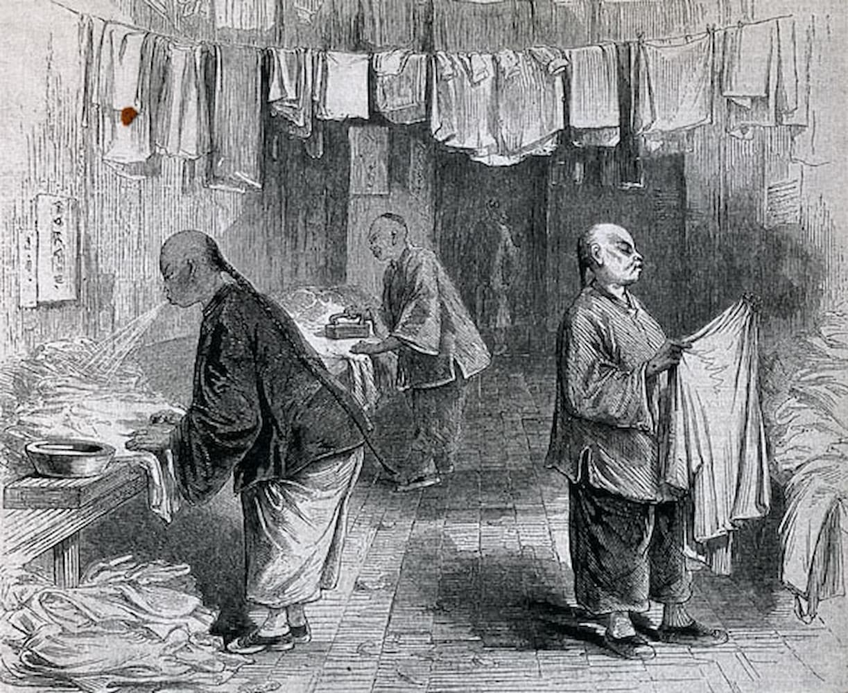 Cartoon of three Chinese men with queue hairstyles wearing shanku and working in a laundry. One man blows, another irons and the last folds clothes.