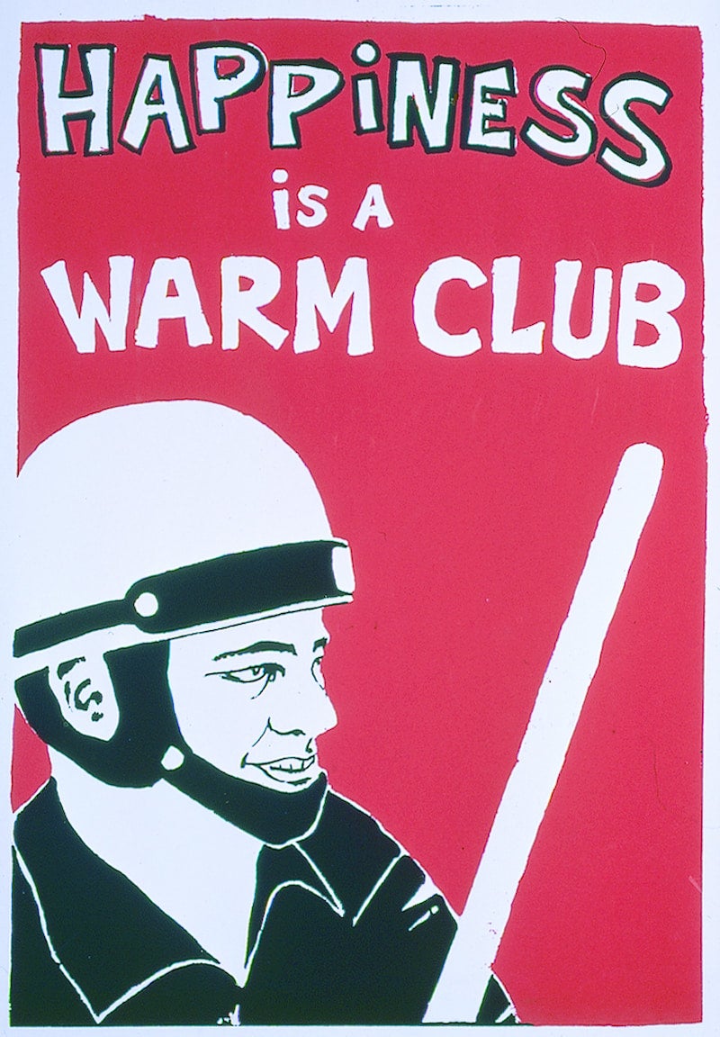 Black and white sketched man with a baton and helmet with a prominent chin strap and the slogan Happiness is a Warm Club, all set on a red background.
